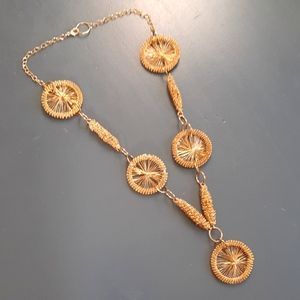 VINTAGE 'GOLD COCOONS AND WHEELS'